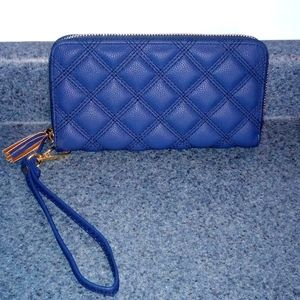 Blue quilted wristlet wallet. NWT